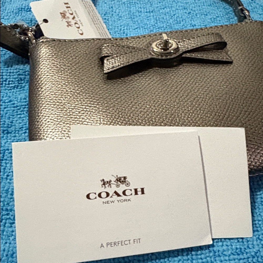 Coach Silver wristlet with bow turnlock nwt - Picture 6 of 8